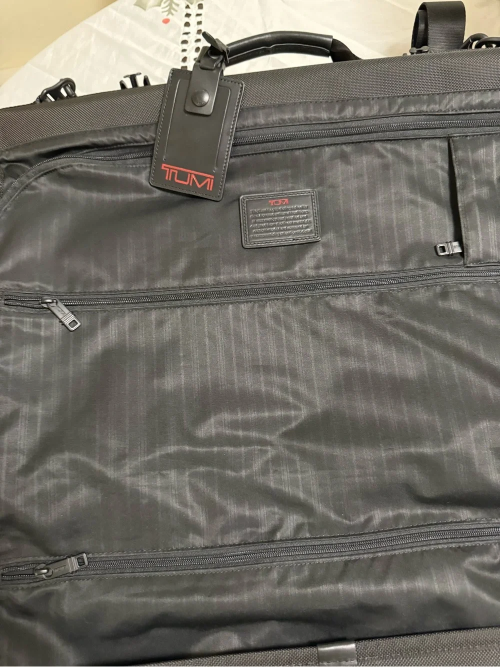 Tumi Black Roll-Top Briefcase with Red Logo Tag